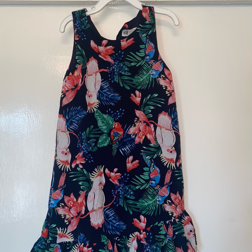 2 dresses. H&M summer tropical size 7-8Y and Lace Striped Black White Tied- 8Y